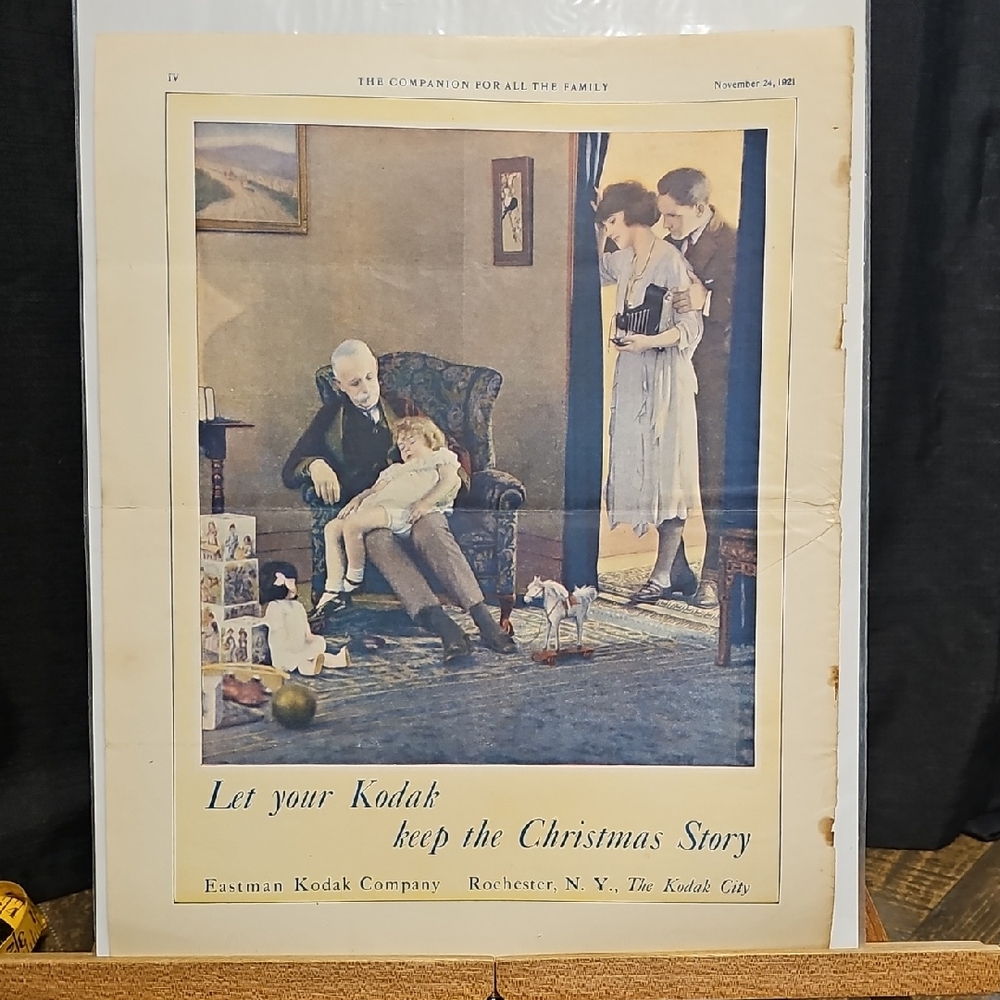 Kodak Family Christmas Scene Poster with Blue and White Accents